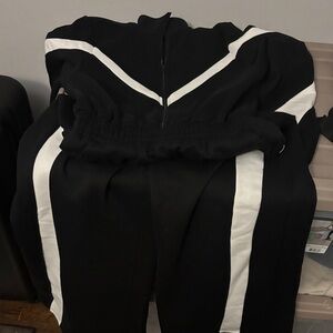 Fashion Nova Black Jogger Jumpsuit with White Stripe Accents